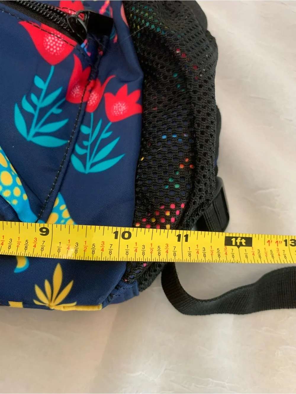 Child’s colorful dinosaur backpack